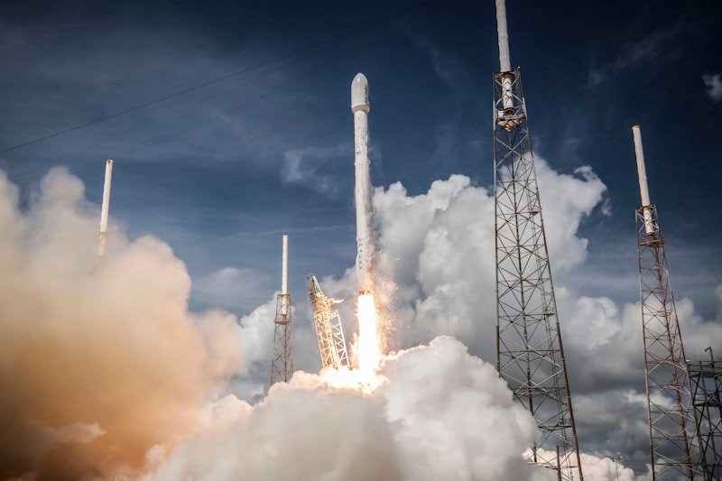 Rocket launching into the sky representing deployment and tracking
